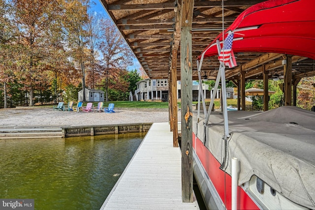 dock area featuring a water view