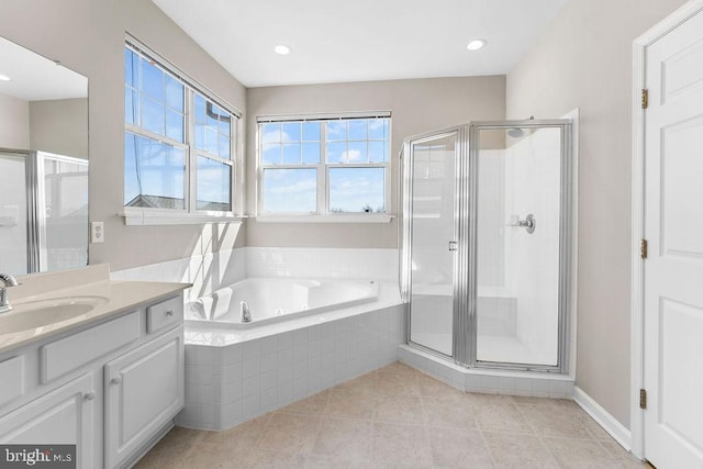 full bath with tile patterned flooring, recessed lighting, vanity, a bath, and a stall shower