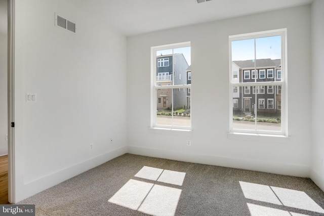 view of carpeted spare room