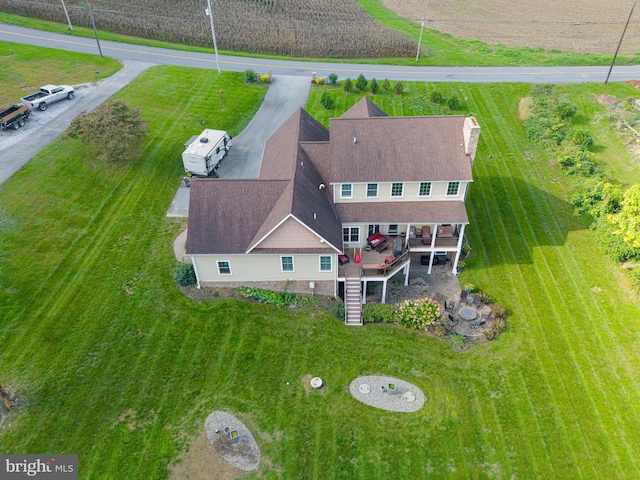 birds eye view of property featuring a rural view