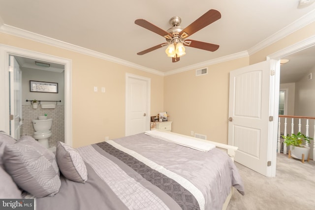 bedroom featuring crown molding, ceiling fan, connected bathroom, and light carpet