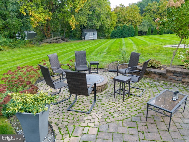 view of patio / terrace with a storage shed