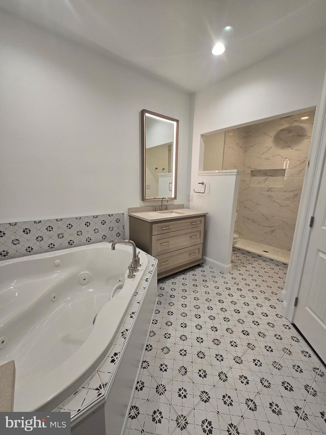 bathroom with vanity and plus walk in shower