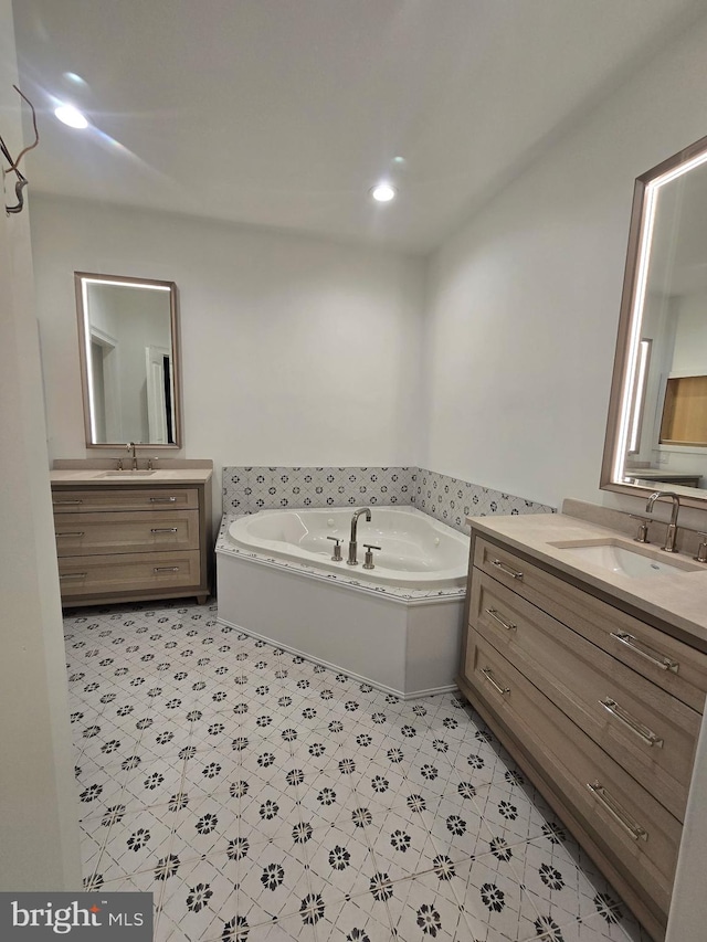 bathroom featuring vanity and a bathtub