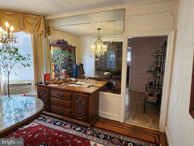 kitchen featuring a notable chandelier and crown molding