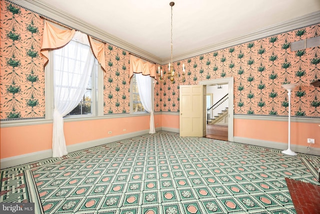 unfurnished room featuring crown molding