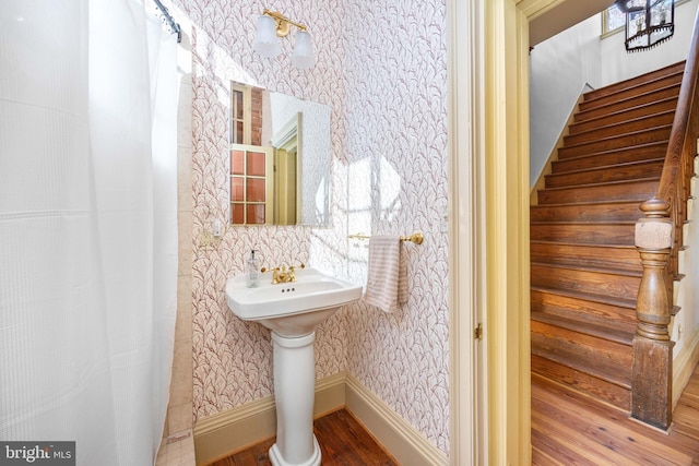 bathroom featuring wood-type flooring