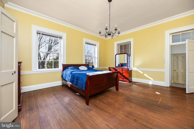 bedroom with ornamental molding, a notable chandelier, and dark hardwood / wood-style flooring