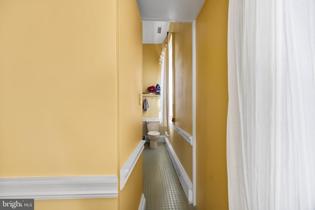 interior space with tile patterned floors