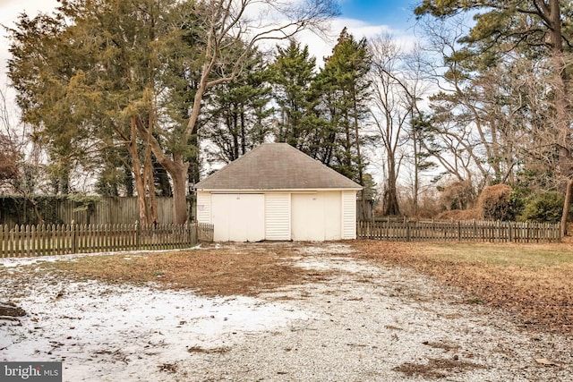 view of side of home with a storage unit