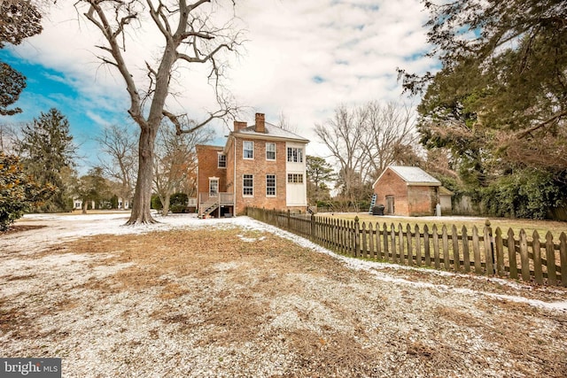 view of snow covered property