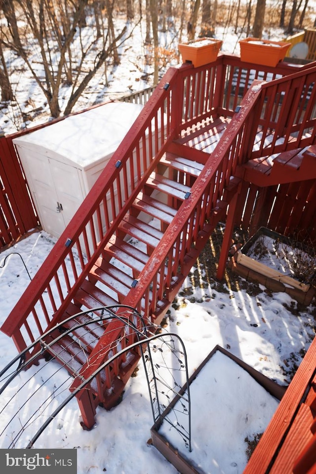 view of snow covered deck