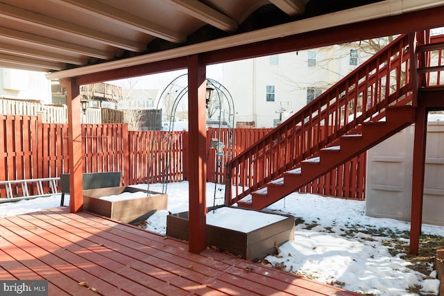 view of snow covered deck