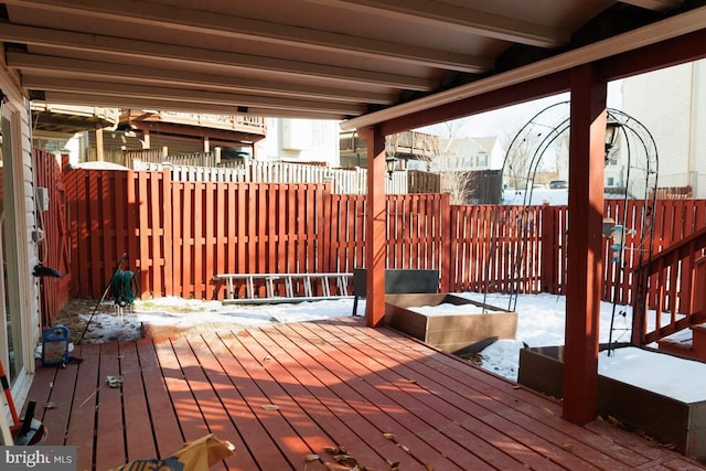 view of snow covered deck