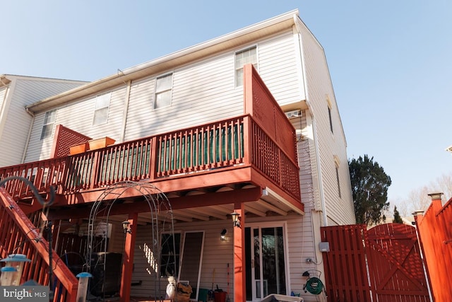 rear view of property with a deck