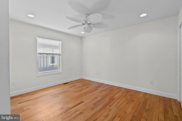 spare room featuring ceiling fan, recessed lighting, visible vents, baseboards, and light wood-style floors