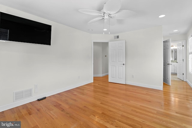 unfurnished bedroom featuring light wood-style floors, recessed lighting, visible vents, and baseboards