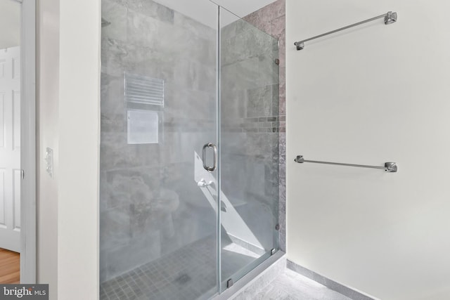 bathroom with a stall shower