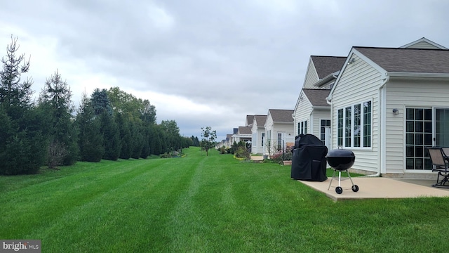 view of yard with a patio area