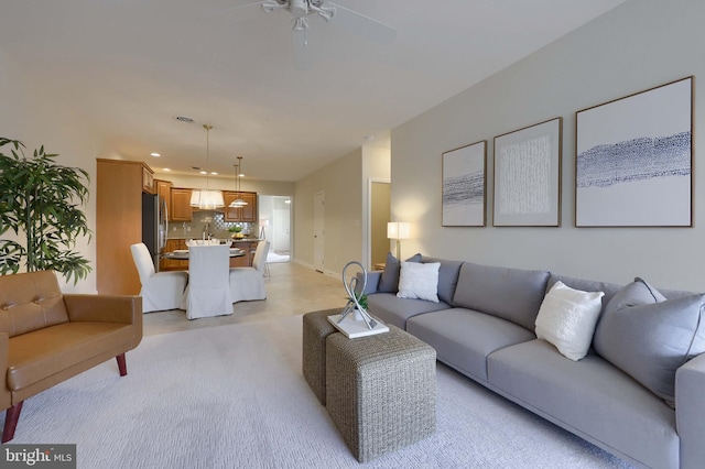 living room with ceiling fan