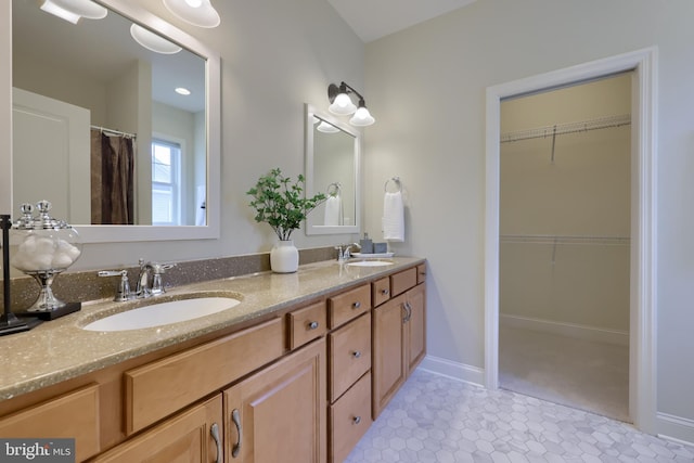 bathroom featuring vanity and tile patterned flooring