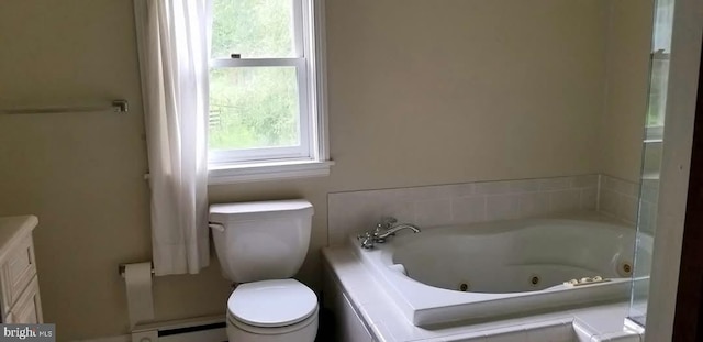 bathroom with a baseboard heating unit, a washtub, and toilet