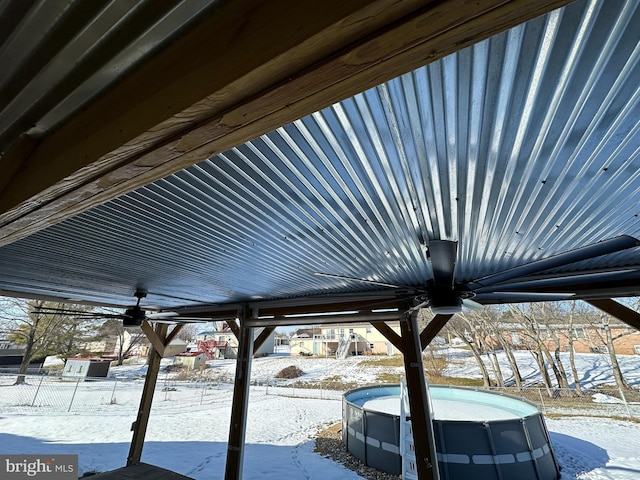 view of snow covered patio