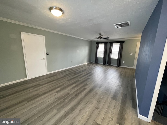 unfurnished room with ceiling fan, hardwood / wood-style flooring, ornamental molding, and a textured ceiling