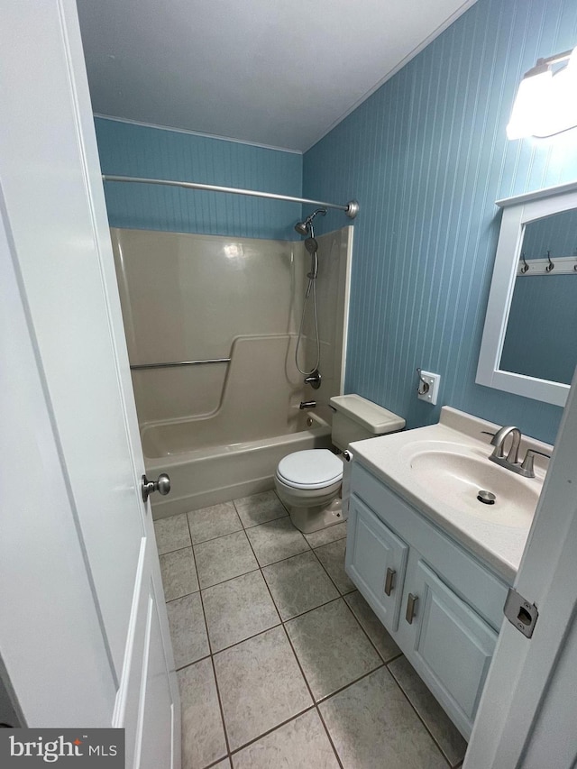 full bathroom with vanity, tile patterned floors, toilet, and shower / bath combination