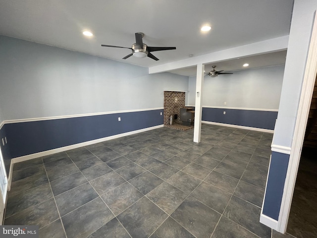 basement featuring ceiling fan