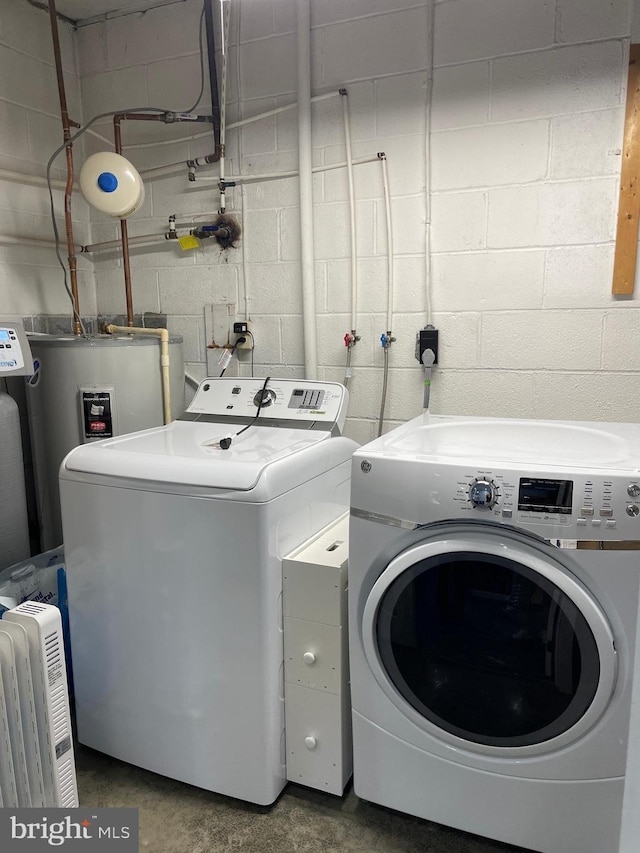 laundry area featuring separate washer and dryer