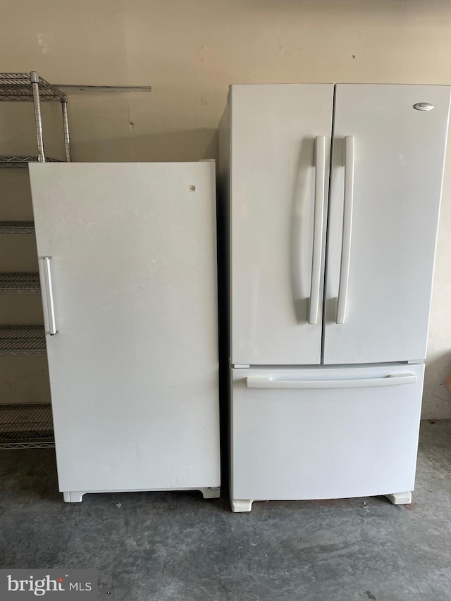 interior space featuring white refrigerator