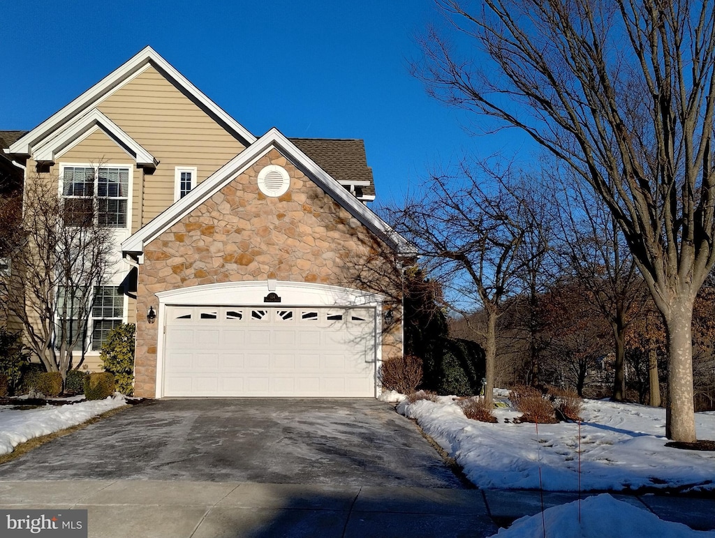 view of front of property featuring a garage