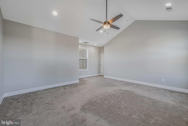 carpeted empty room featuring ceiling fan and high vaulted ceiling