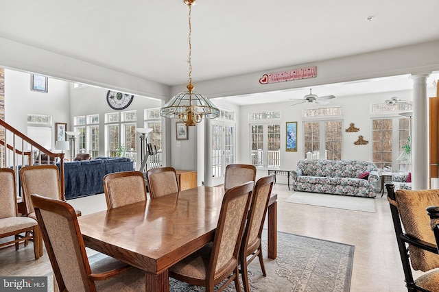 dining space with ornate columns