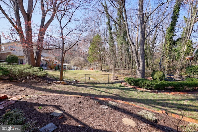 view of yard featuring fence