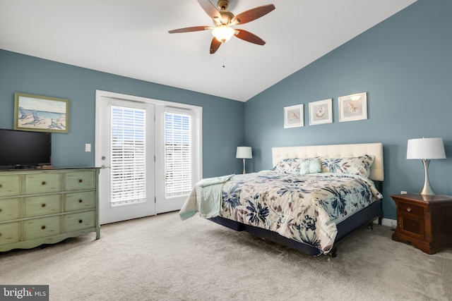 carpeted bedroom featuring lofted ceiling, access to outside, and ceiling fan