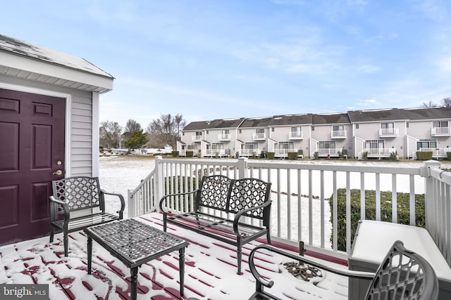 wooden terrace featuring a residential view