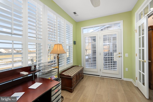 entryway with light hardwood / wood-style flooring