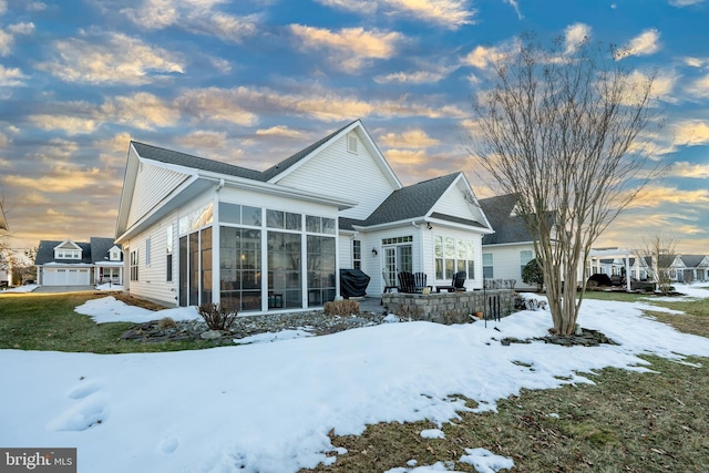 exterior space featuring a sunroom