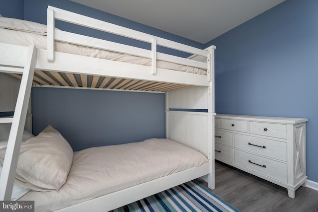 bedroom featuring dark wood-type flooring