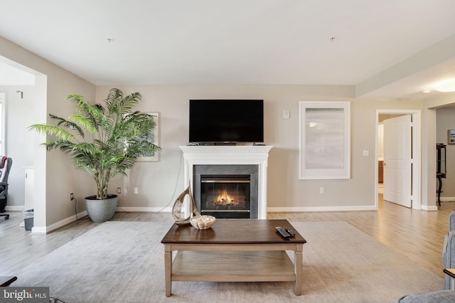 living room with light hardwood / wood-style floors