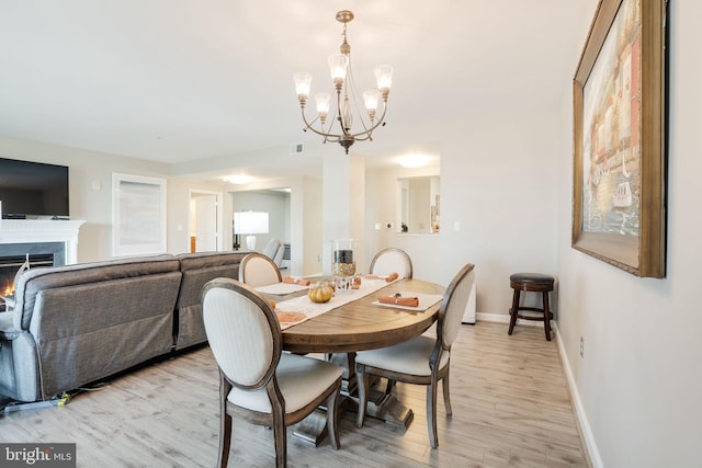 dining space featuring light hardwood / wood-style floors