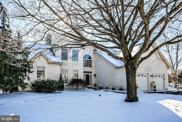 view of front of property featuring a garage