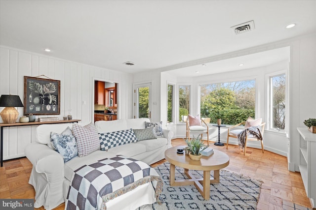 living room with light parquet floors