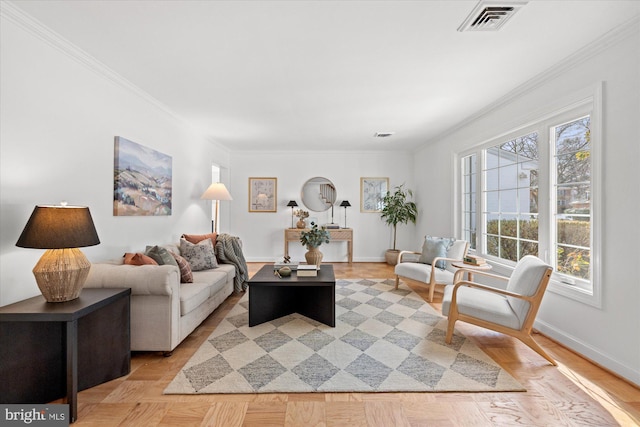 living room featuring crown molding