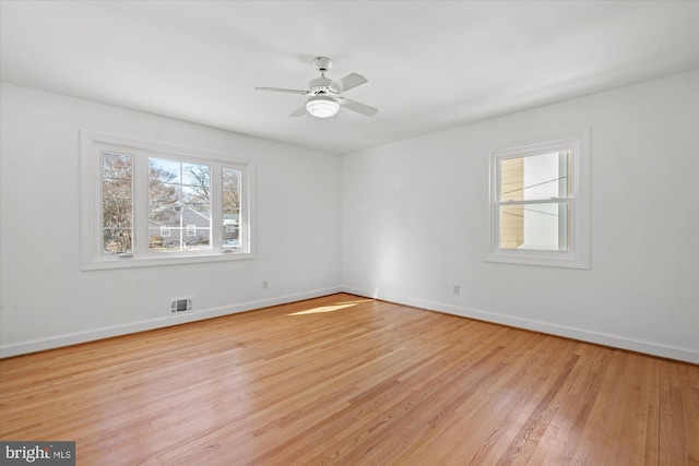 unfurnished room featuring ceiling fan and light hardwood / wood-style flooring