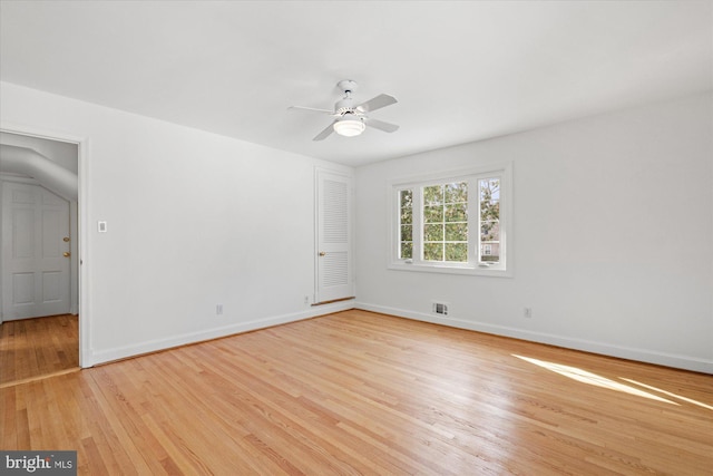 unfurnished room with light hardwood / wood-style flooring and ceiling fan