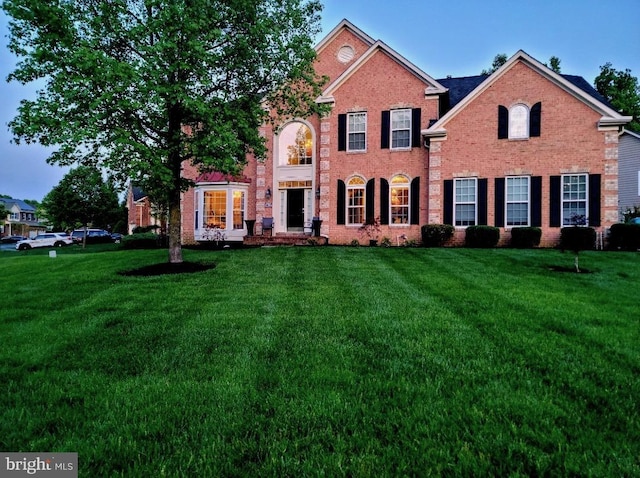 view of front of property with a front lawn