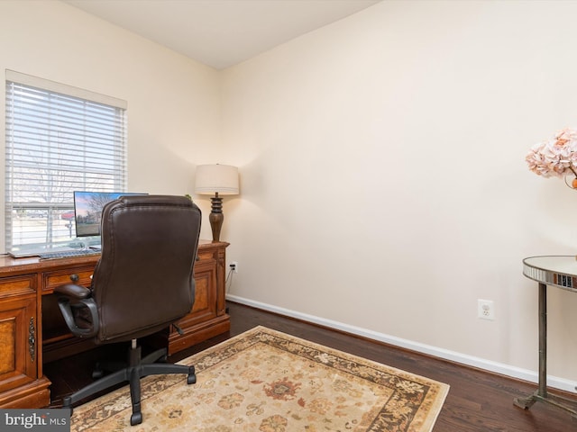 office space with dark hardwood / wood-style floors